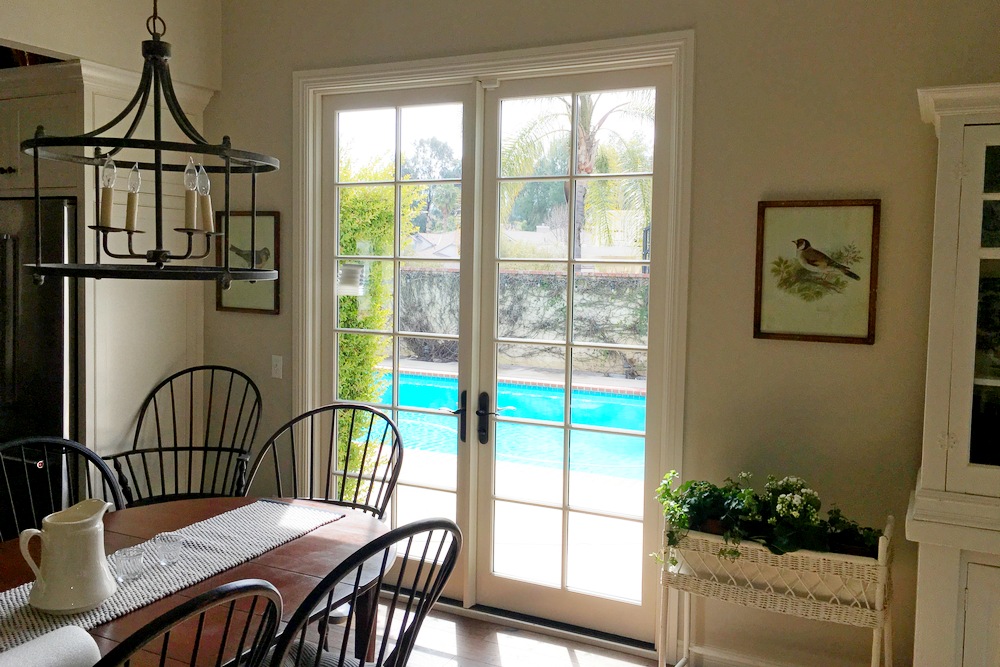 Swinging Patio Doors Add a Classic Look & Feature Today's Quality Materials